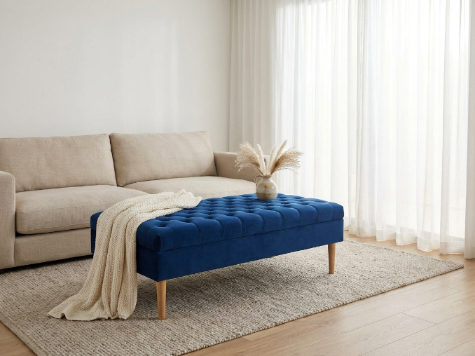 Nordic minimalist living room with blue velvet storage ottoman centerpiece 